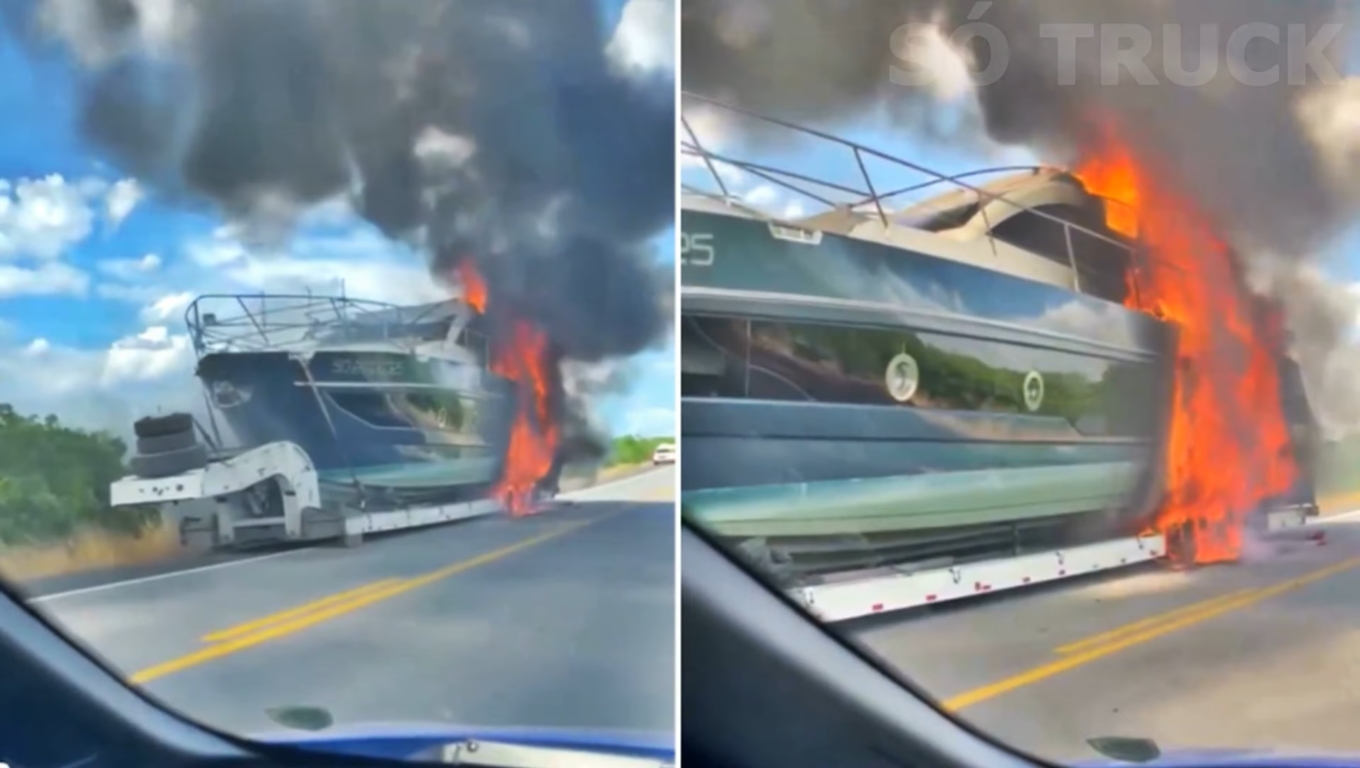 Carreta que transportava uma lancha de luxo pega fogo e embarcação avaliada em mais de R$ 10 milhões é destruída